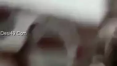 MILF with Desi features decides to expose tits with big XXX buttons