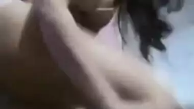 Pretty Desi gal puts on clothes and records this XXX process on cam