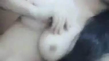 Cute Desi girl gives air kisses posing XXX topless in the bathroom