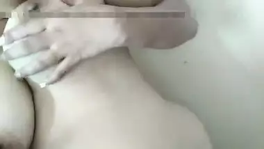 Girl films a porn movie about her Indian twins with pale nipples