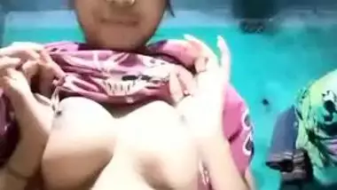 Desi teeny exposes big XXX boobs and plays with them in a sexy way