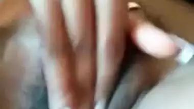 Indian girl puts hand down there and masturbates XXX pussy close-up