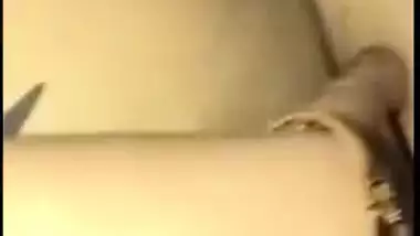 Young gal in red lingerie teases her XXX Desi pussy for the camera