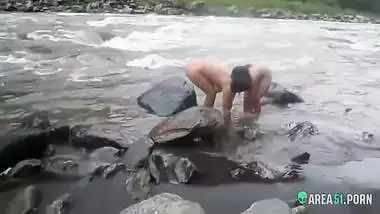 Voyeur sex clip two sexy desi aunty taking a bath outdoor by the river