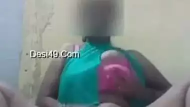 Slutty Desi chick hides her face when XXX fingering her hairy twat