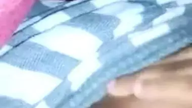 Desi girl pulls T-shirt up and exposes small boobs with big nipples