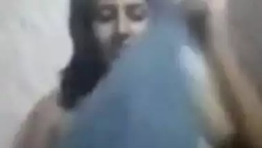 Sweet Desi gal sneaks in bathroom to show tits with big XXX nipples