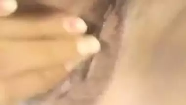 Lecherous Desi cutie shows off her nude XXX pussy on selfie video