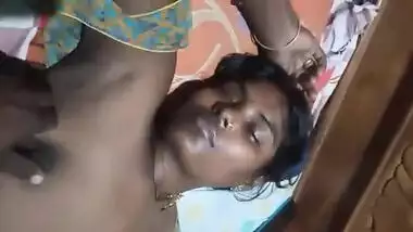 Village Desi XXX wife gets her boobs pressed by hubby while sleeping MMS