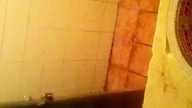 Girl spying on her stepmom having nude bath