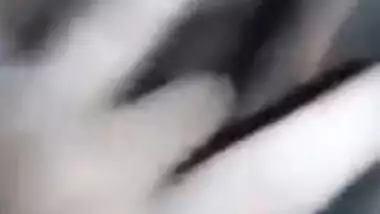 Horny Desi gal displays saggy tits and also fingers her XXX cunny