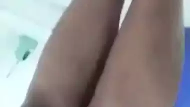 Beautiful desi girl lifting top to reveal sexy boobs