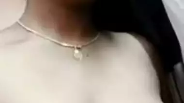 Sexy Indian wife opens big XXX hooters with dark nipples on amateur cam