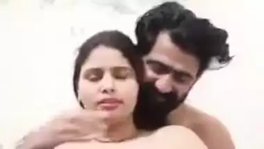 Desi XXX whore allows bearded guy to take her bra off and touch titties