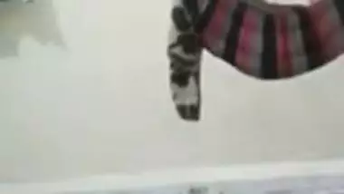 Busty Desi bhabhi spreads legs and fingers her XXX twat on the cam