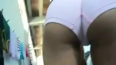 Young Desi housewife does chores with her round XXX booty exposed