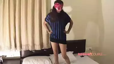 Indian girl with red mask takes XXX poses to tempt young man into sex