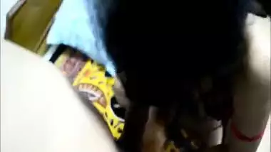 Desi female in a XXX red bra takes sex partner's tool in mouth