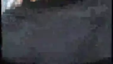 Two whore nude dance in village, public place, infront of people