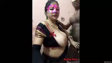 Desi guy trying to fully take aunty boobs in mouth video call