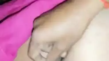 Naughty Indian XXX husband fingering his wife’s tight ass hole MMS