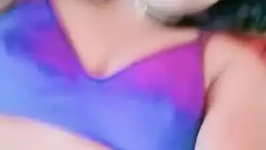 Titillating Desi girl makes boobies and smooth pussy known in sex show