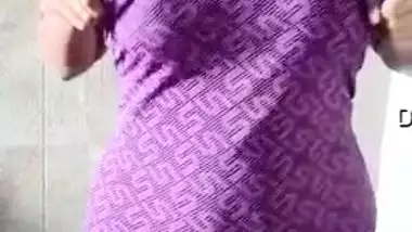 Desi slut takes off swimsuit to show her XXX tits in the mirror