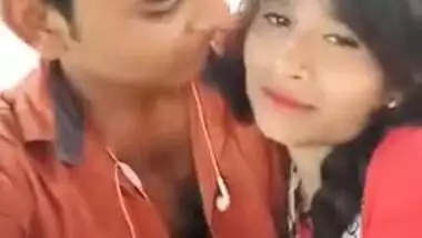 Handsome young man paws Indian's perfect boobs through red dress