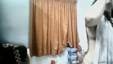 Paunchy housewife of Indian origin walks naked in front of camera