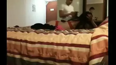 Catches a cheating wife having sex in a hotel room