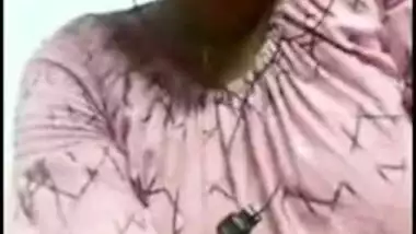 Sexy Desi mom exposes boobies to jerking off man on the other side